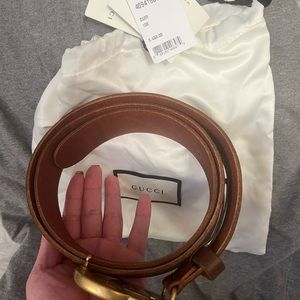 Brown Gucci belt. Never worn. Comes with original packaging (dust bag and box).